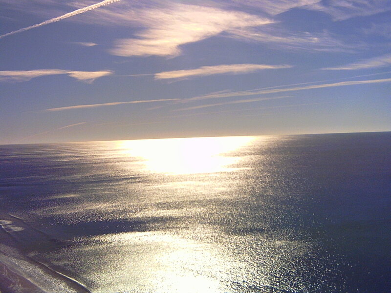 Sun Reflecting on Ocean — Blue, Serene, Sunrise