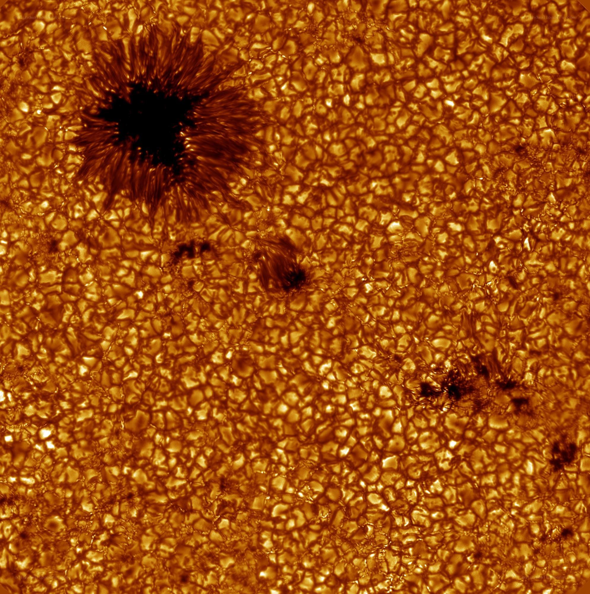 Sun's surface with sunspots