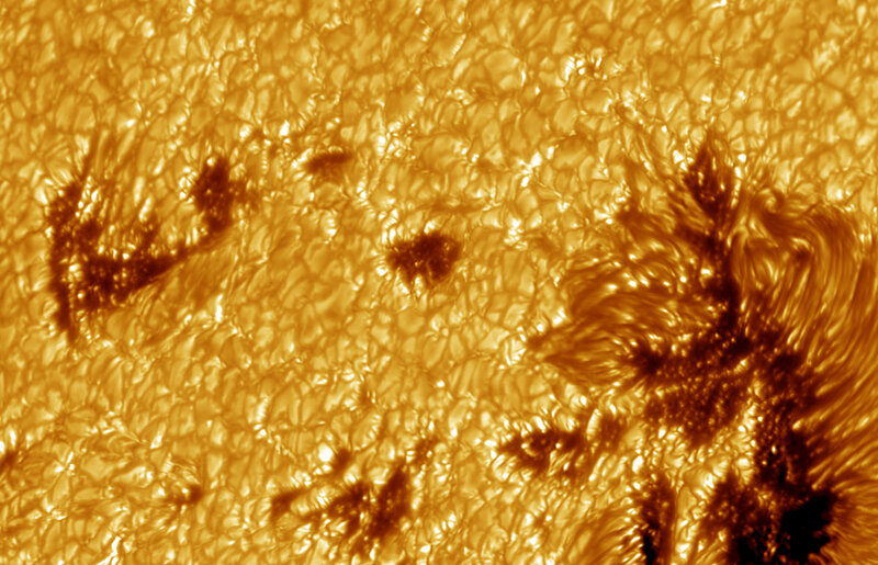 Sun's surface with sunspots