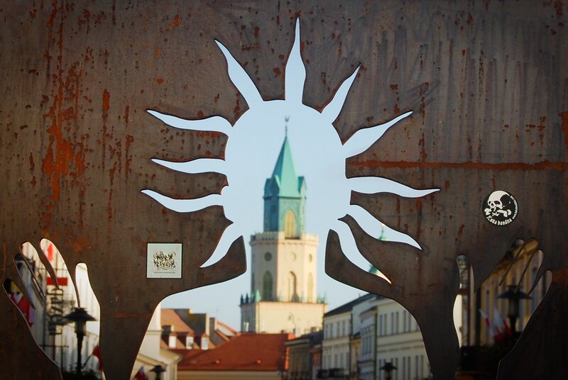 Sun sculpture with tower view