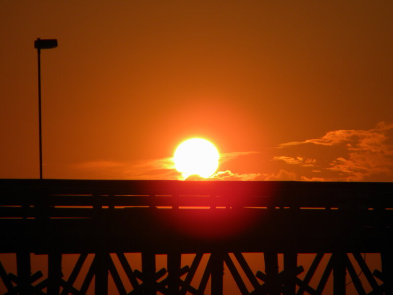 Sun Setting Behind Bridge