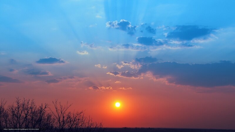 Sun Setting Behind Clouds — Blue, Dramatic, Sunset, Photograph, Trees, Sky