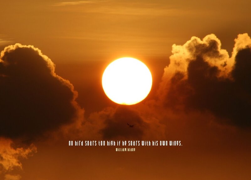 Sun Setting Behind Clouds — Orange, Dramatic, Sunset, Photograph, Bird, Text