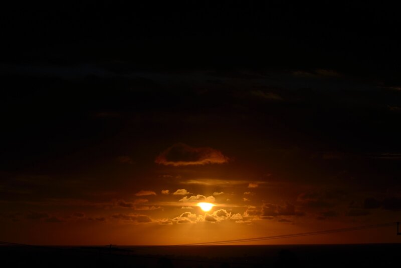 Sun Setting Behind Clouds — Orange, Dramatic, Sunset, Photograph, Horizon, Power Lines
