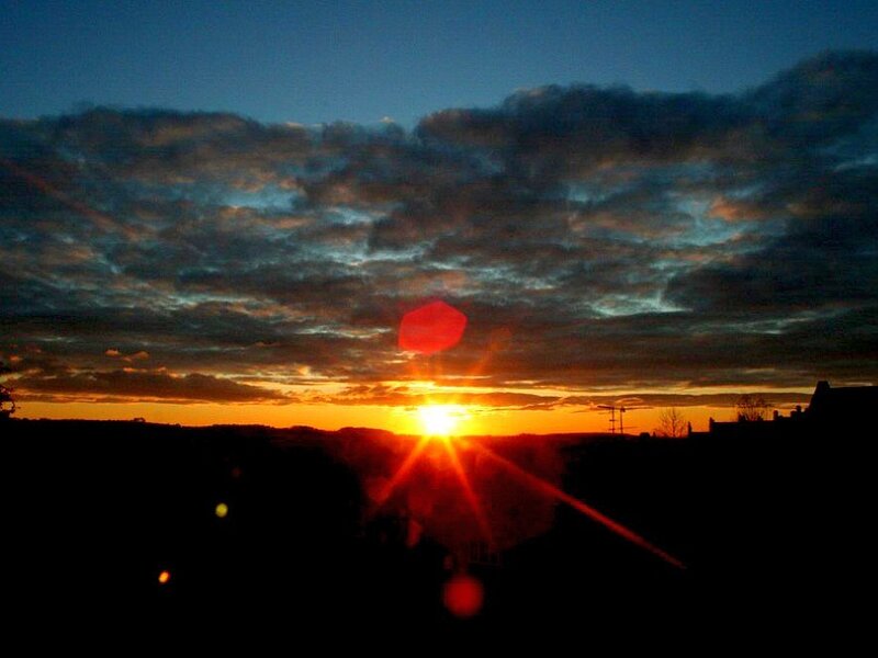 Sun Setting Behind Clouds — Orange, Dramatic, Sunset, Photograph, Horizon, Silhouette