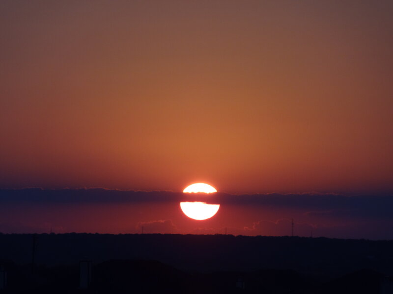 Sun Setting Behind Clouds — Orange, Dramatic, Sunset, Photograph, Horizon