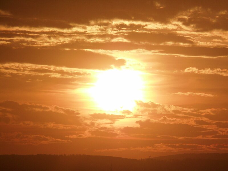 Sun Setting Behind Clouds — Orange, Dramatic, Sunset, Photograph, Horizon, Wind Turbine