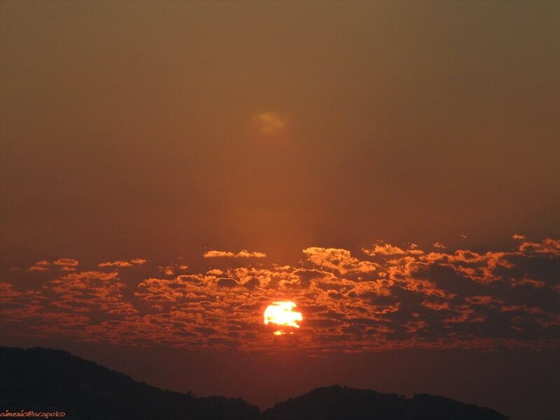 Sun Setting Behind Clouds — Orange, Dramatic, Sunset, Photograph, Mountains, Sky, Red