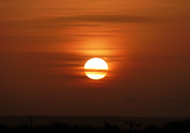Sun Setting Behind Clouds — Orange, Dramatic, Sunset, Photograph, Silhouette, Power Lines