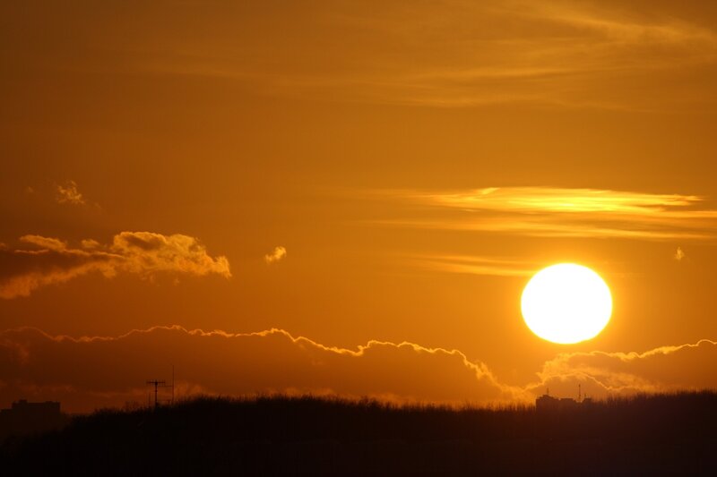 Sun Setting Behind Clouds — Orange, Dramatic, Sunset, Photograph, Silhouette, Sky