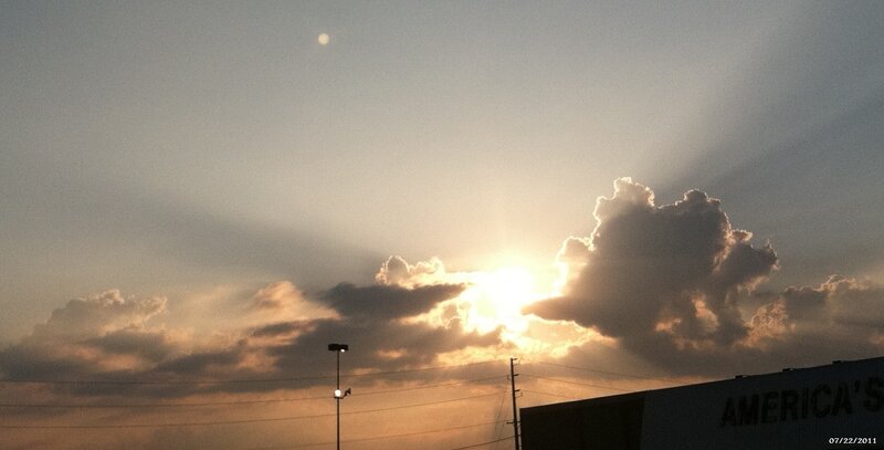 Sun Setting Behind Clouds — Orange, Dramatic, Sunset, Photograph, Street Light