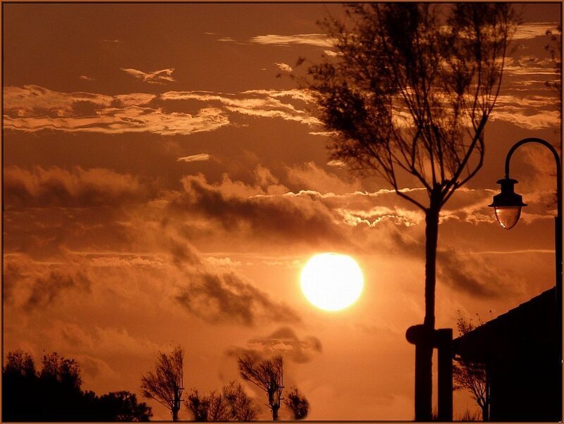 Sun Setting Behind Clouds — Orange, Dramatic, Sunset, Photograph, Tree