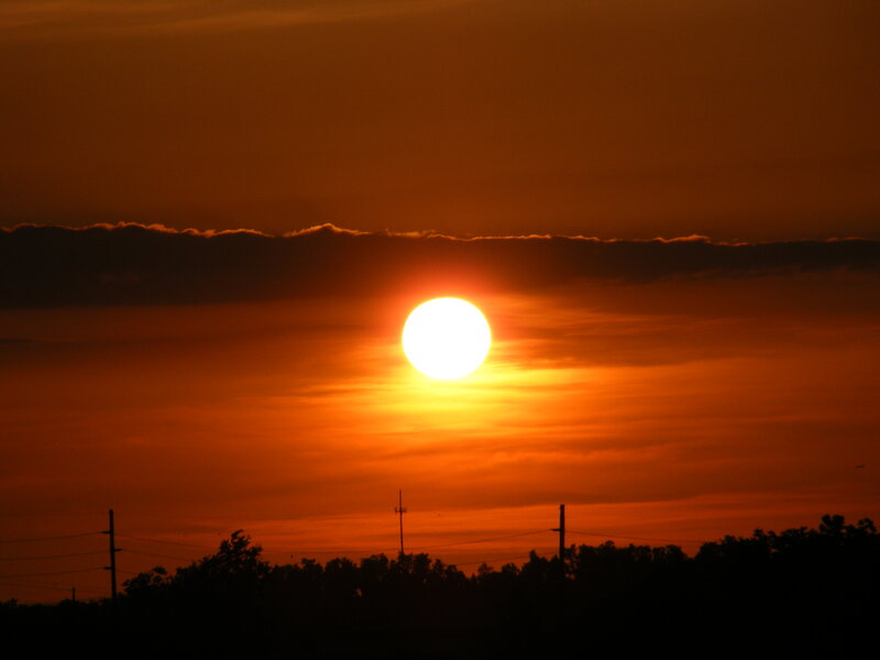 Sun Setting Behind Clouds — Orange, Dramatic, Sunset, Photograph, Trees, Power Lines