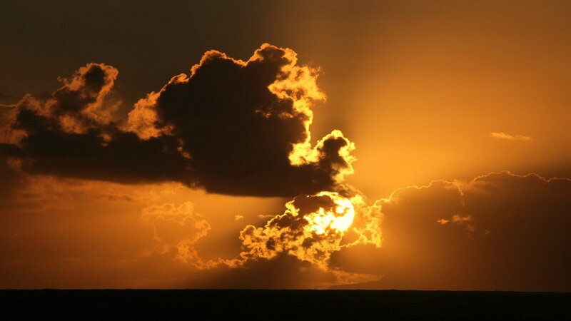 Sun Setting Behind Clouds — Orange, Horizon