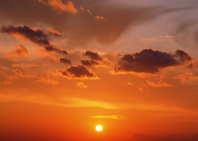 Sun Setting Behind Clouds — Orange, Red