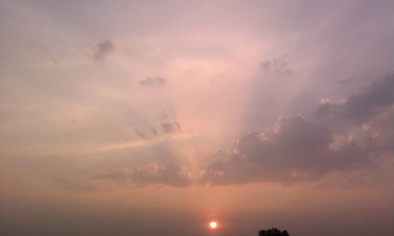 Sun Setting Behind Clouds — Purple, Serene, Sunset