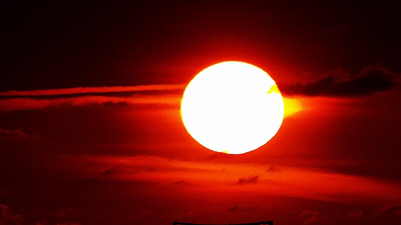 Sun Setting Behind Clouds — Red, Dramatic, Sunset, Photograph, Orange