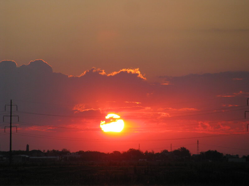 Sun Setting Behind Clouds — Red, Dramatic, Sunset, Photograph, Power Lines