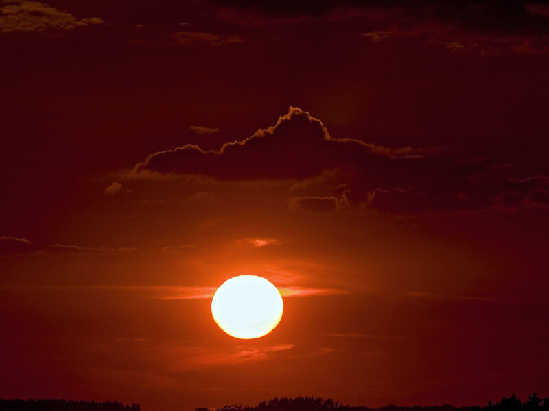 Sun Setting Behind Clouds — Red, Dramatic, Sunset, Photograph, Sky, Horizon