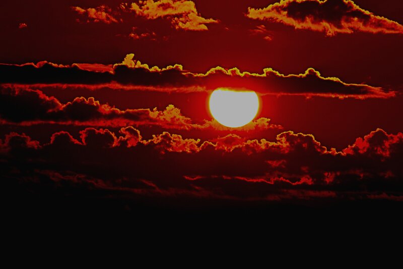 Sun Setting Behind Clouds — Red, Dramatic, Sunset, Photograph, Sky