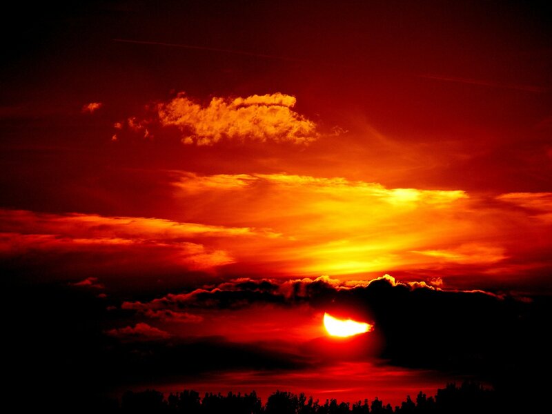 Sun Setting Behind Clouds — Red, Dramatic, Sunset, Photograph, Sky, Trees