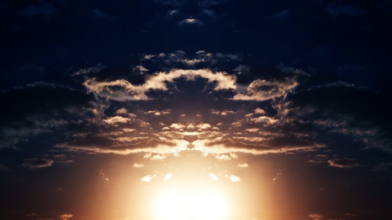 Sun Setting Behind Clouds — Sky