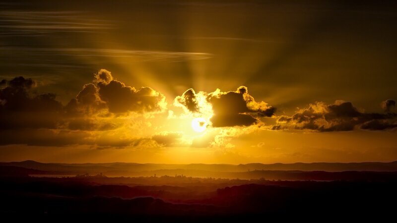 Sun Setting Behind Clouds — Yellow, Dramatic, Sunset, Photograph, Mountains