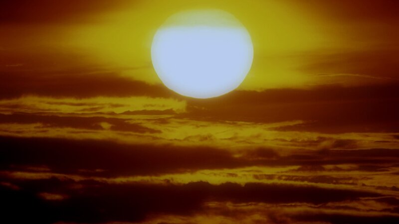 Sun Setting Behind Clouds — Yellow, Dramatic, Sunset, Photograph, Orange