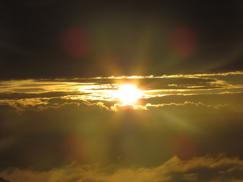 Sun Setting Behind Clouds — Yellow, Dramatic, Sunset, Photograph, Sky