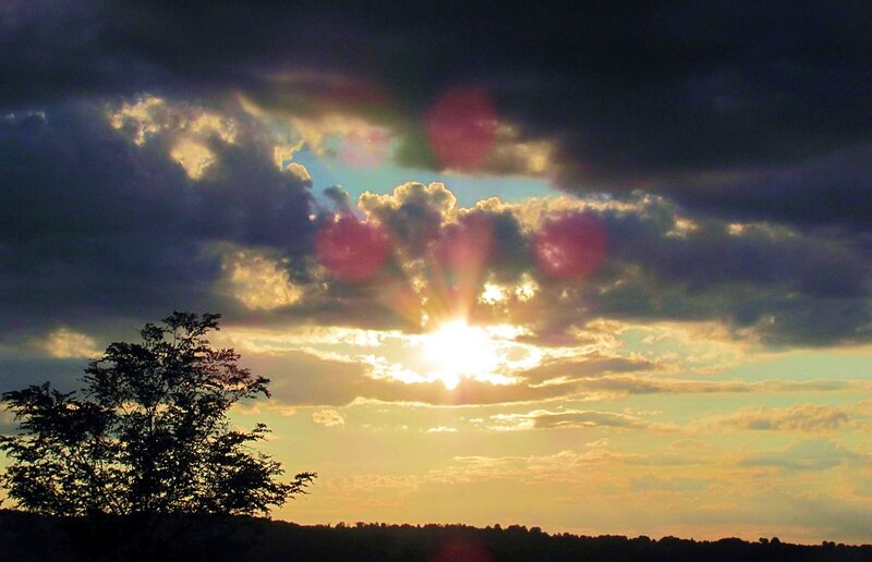 Sun Setting Behind Clouds — Yellow, Dramatic, Sunset, Photograph