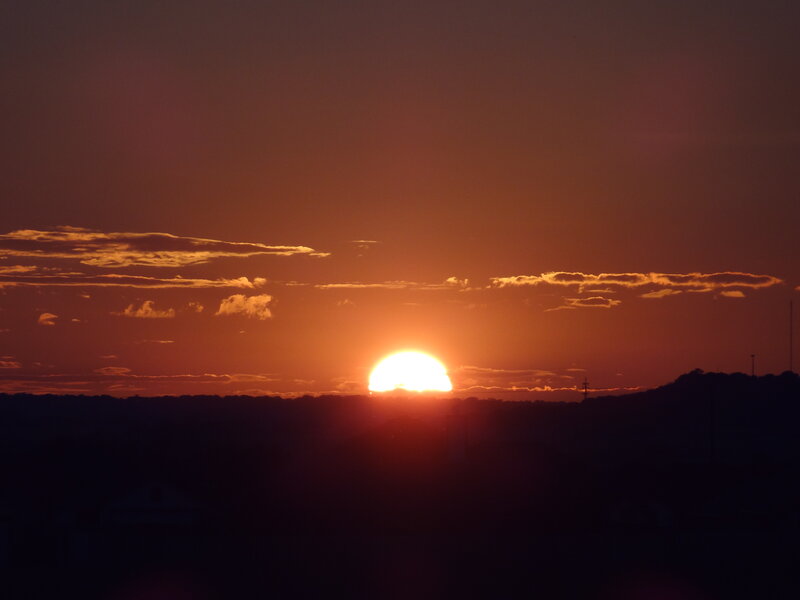 Sun Setting Behind Hills — Orange, Dramatic, Sunset, Photograph, Clouds