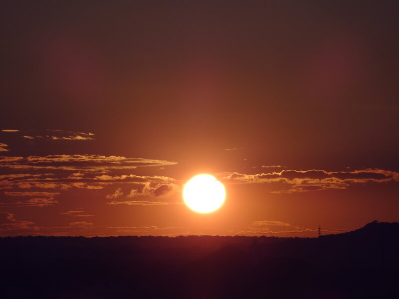 Sun Setting Behind Hills — Orange, Dramatic, Sunset, Photograph, Clouds, Tower