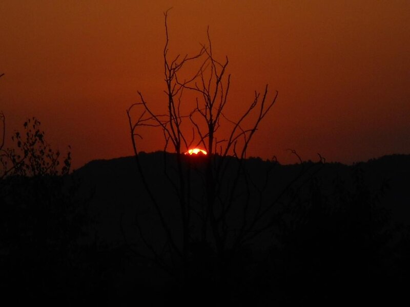 Sun Setting Behind Hills — Orange, Dramatic, Sunset