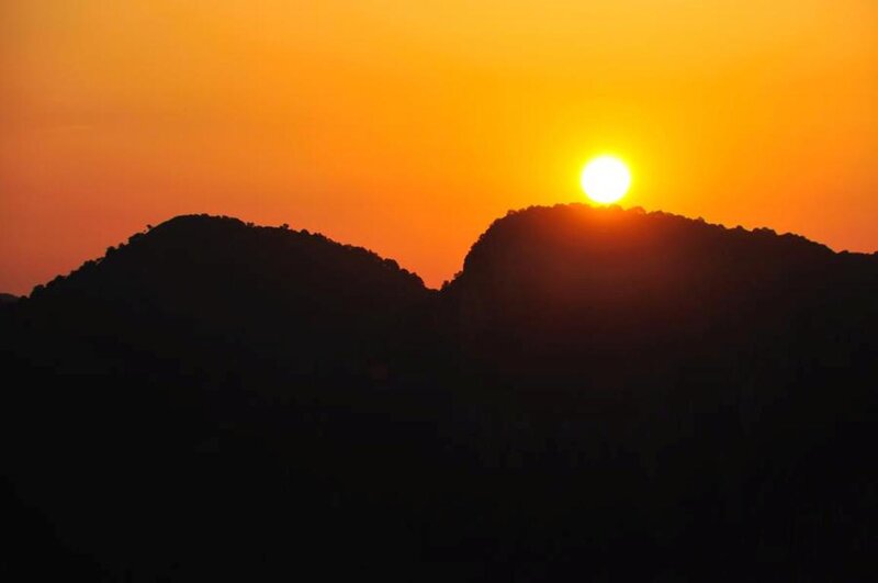 Sun Setting Behind Hills — Orange, Serene, Sunset, Photograph, Sky