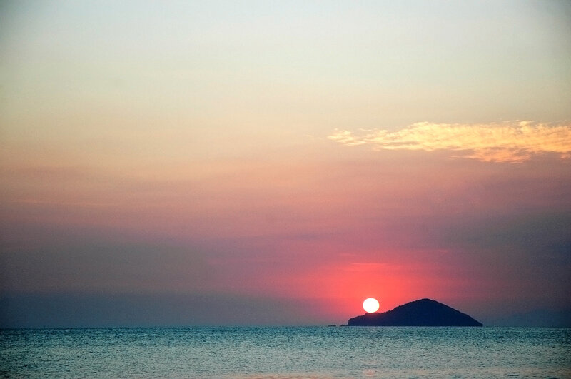 Sun Setting Behind Island