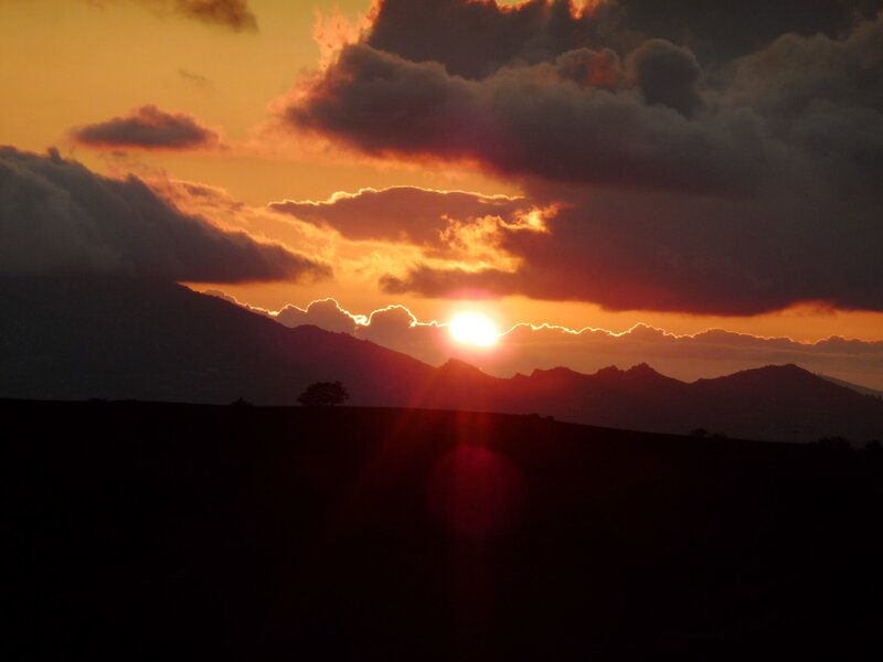 Sun Setting Behind Mountains — Orange, Dramatic, Sunset, Photograph, Clouds, Tree