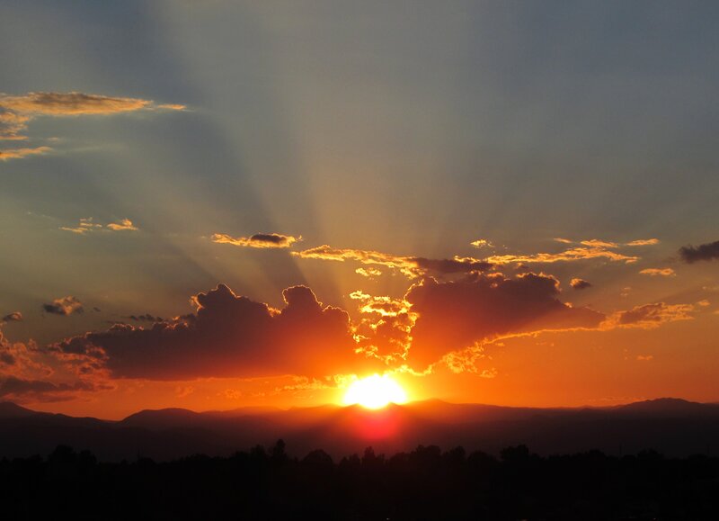 Sun Setting Behind Mountains — Orange, Dramatic, Sunset, Photograph, Clouds, Trees