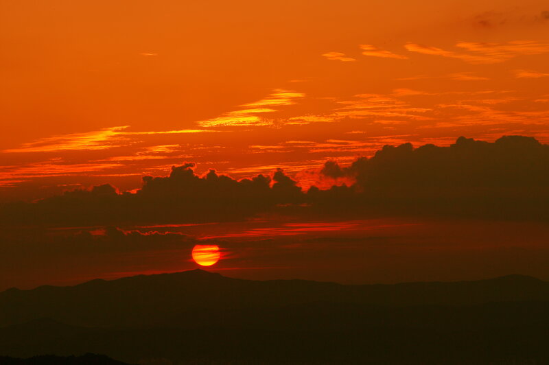 Sun Setting Behind Mountains — Orange, Dramatic, Sunset