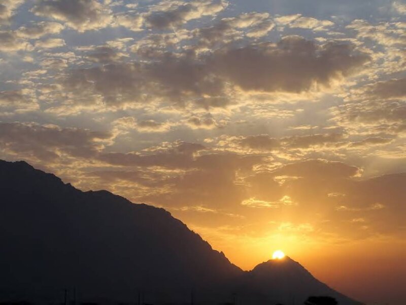 Sun Setting Behind Mountains — Orange, Serene, Sunset, Photograph, Clouds