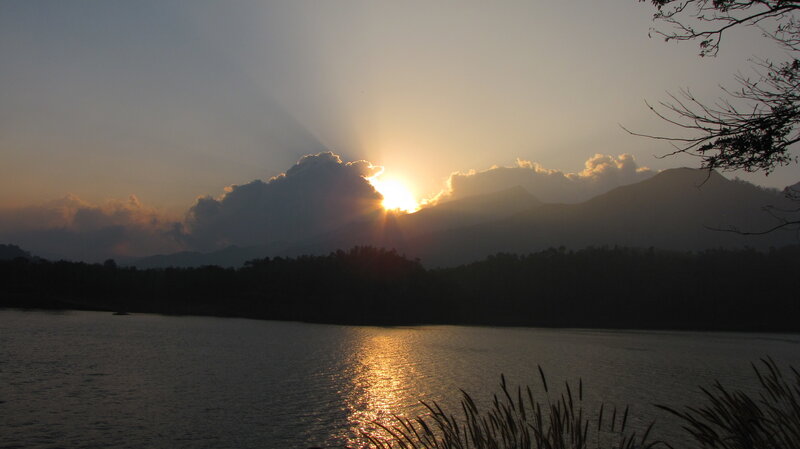 Sun Setting Behind Mountains — Orange, Serene, Sunset