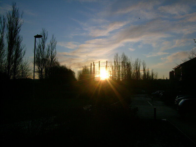 Sun Setting Behind Pylons