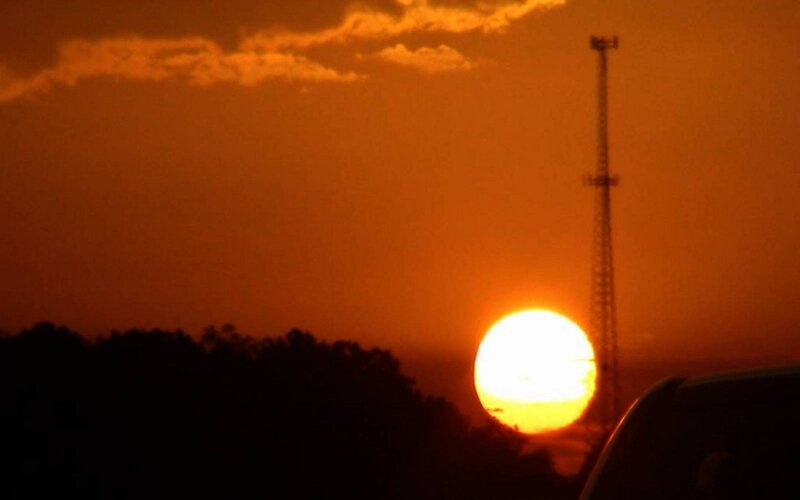 Sun Setting Behind Tower