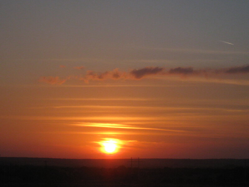 Sun Setting on Horizon