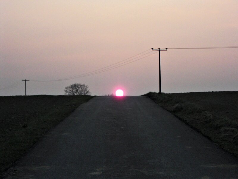 Sun Setting on Road