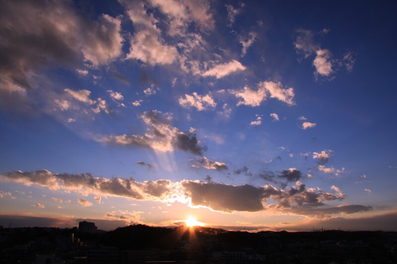 Sun Setting over City — Blue, Dramatic