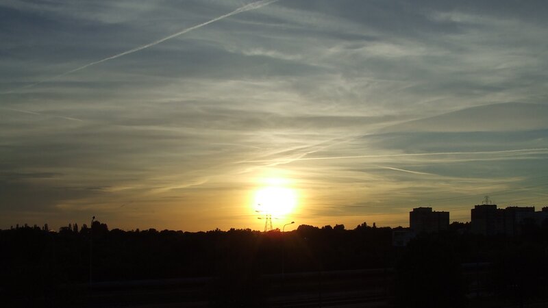 Sun Setting over City — Yellow