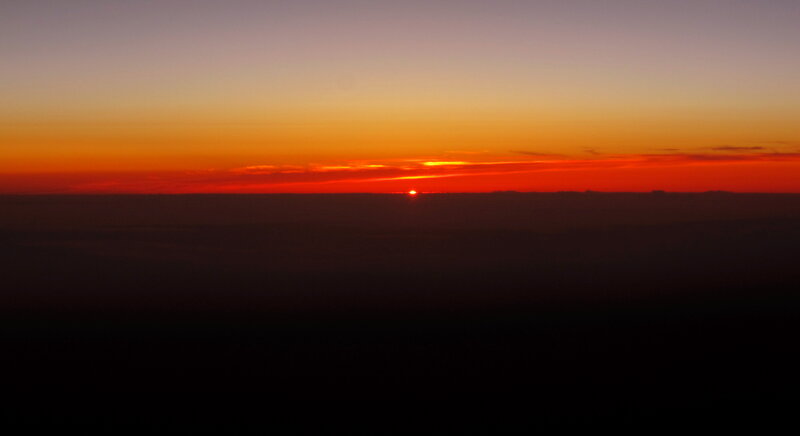 Sun Setting over Clouds — Orange, Dramatic
