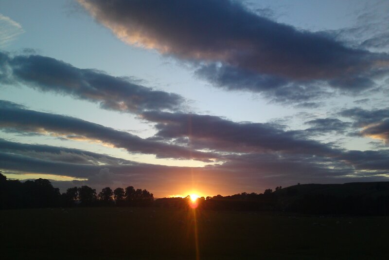 Sun Setting over Field — Orange, Serene, Sunset, Photograph, Clouds