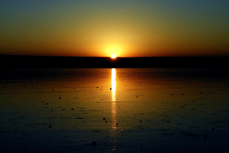 Sun Setting over Frozen Lake