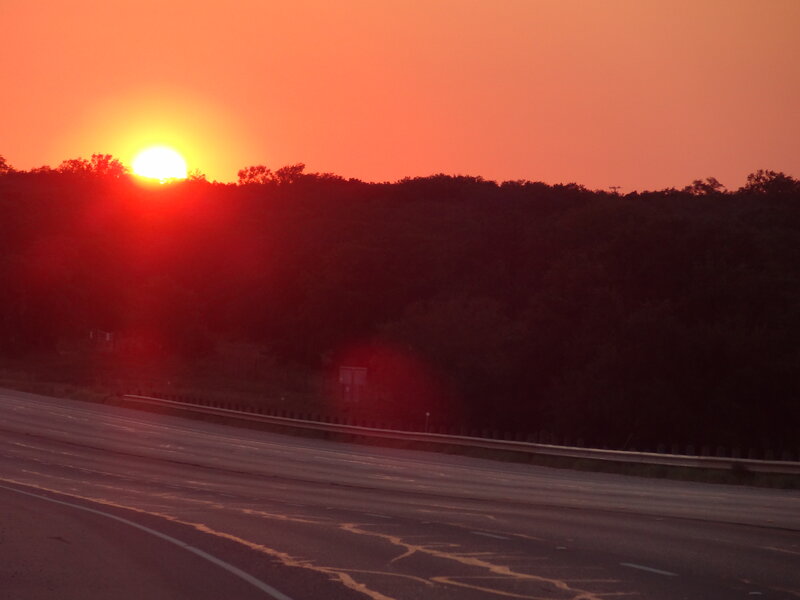 Sun Setting over Highway